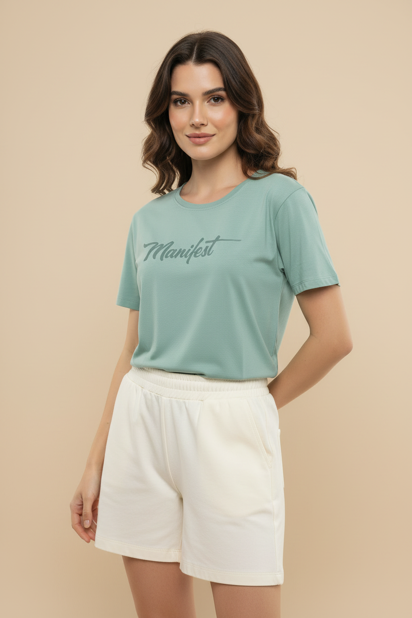 Model wearing mint green Manifest t-shirt - clean version