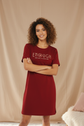 Model wearing burgundy dress