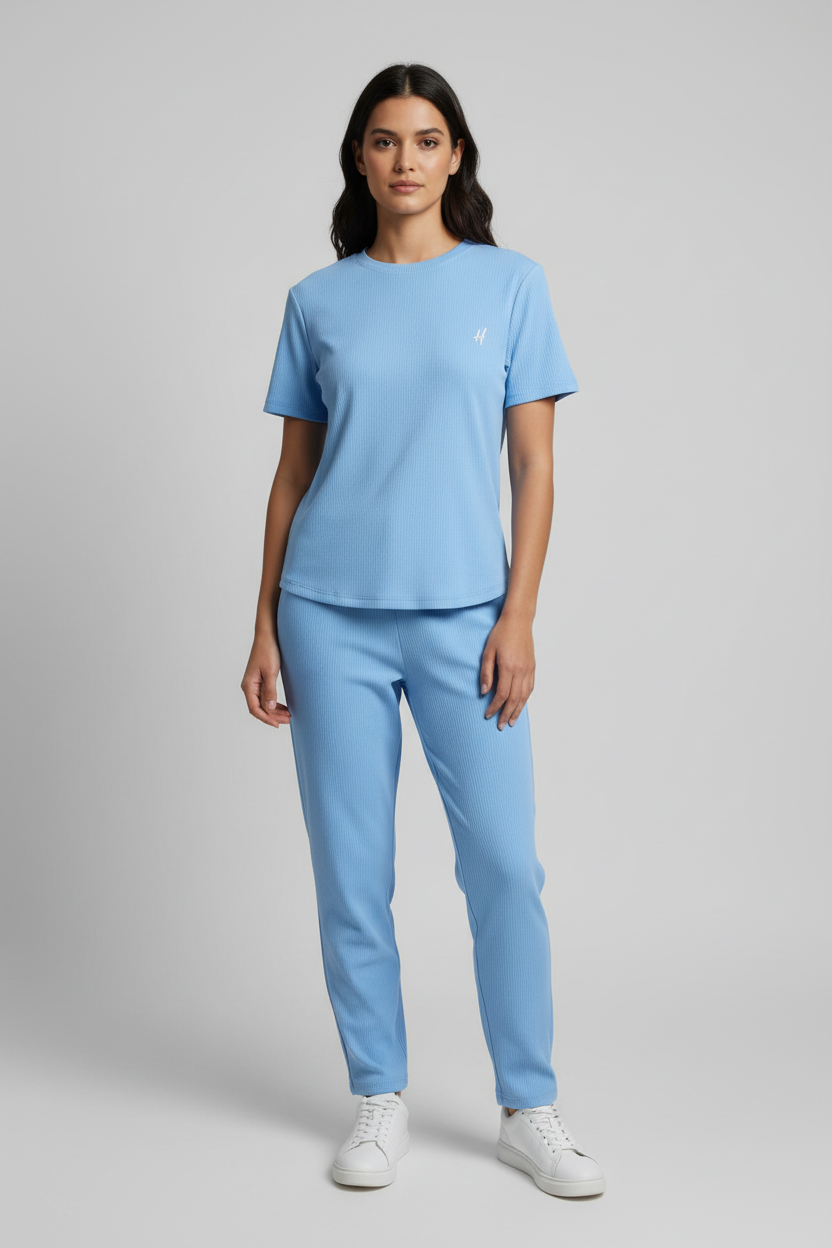 Model wearing sky blue co-ord set - no logo on pants